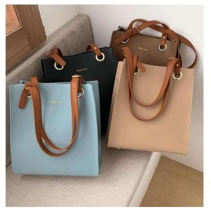 Albeida Tote bags